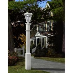 This New England Arbors 5 in. x 71 in. Sturbridge Lamp Post (lamp fixture purchased separately) is made of weather-resistant vinyl to withstand the elements. The post includes a universal 3 in. collar mounting cap to allow you to install any standard lamp. Weather-resistant to prevent damage from the elements; UV protected to inhibit discoloration. Lamp fixture not included Contains a universal 3 in. mounting collar to hold any standard size post lamp Weather resistant to prevent damage from the elements UV protected to inhibit discoloration Vinyl material For questions or concerns regarding this product, please contact the manufacturers customer service department at 1.800.282.9346 Features Item Weight 23 Product Size Large Number of Lights 1 Light Product Weight (lb.) 15 lb Post Type Lig New England Arbors, Outdoor Lamp Posts, Exterior Light Fixtures, Lantern Post, Lantern Set, Standard Lamps, White Lamp, Post Lights, Exterior Lighting