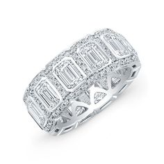 a white gold ring with baguetts and diamonds