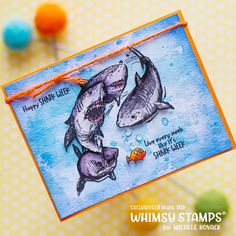 a card with two sharks on it