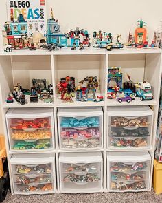 a shelf filled with lots of toy cars and toys