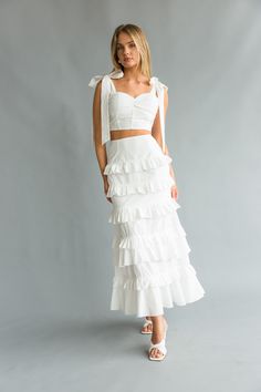 Front view | white bow strap Bustier top with tiered ruffle skirt(set) | vacation dress White Tiered Skirt Dress With Adjustable Straps, White Ruffled Dress-up Sets, Feminine White Maxi Skirt With Ruffles, Feminine White Ruffled Maxi Skirt, White Tiered Mini Skirt With Lace Trim, White Skirt And Top, White Two Piece Outfit, Matching Skirt Set, Ruffle Maxi Skirt