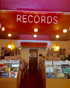 there is a record store with records on the wall