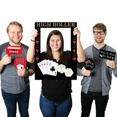 three people holding up signs and playing cards with the words high roller written on them