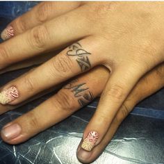 two hands with different designs on them