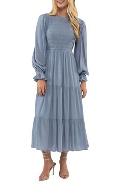 A long-sleeve midi dress offers charming style for any occasion with a smocked bodice, ruffled cuffs and flowy tiered silhouette. 50 1/2" length Back keyhole with button-and-loop closure Crewneck Long sleeves Lined 80% rayon, 20% nylon Hand wash, dry flat Imported Model stats: 5'10" height, 32" bust, 25" waist, 36" hip. Model is wearing size Small. Asian Owned/Founded Modest Dusty Blue Dress, Fall Church Dresses, Long Sleeve Maxi Dress For Brunch, Long Sleeve Solid Maxi Dress For Brunch, Solid Long Sleeve Maxi Dress For Brunch, Casual Midi Dress With Lantern Sleeves For Brunch, Long Sleeve Midi Dress With Ruffle Hem, Billowy Long Sleeve Casual Maxi Dress, Long Sleeve Billowy Dresses In Solid Colors