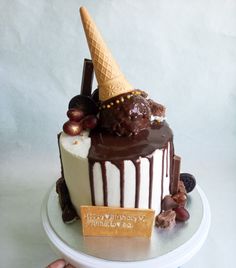 a cake decorated with chocolate and ice cream