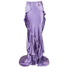 New Tom Ford for Yves Saint Laurent Rive Gauche Silk Maxi Skirt F/W 2003 Runway Collection French size 36 - US 4 Artfully constructed from ruffles which are connected by ties to the skirt. Lavender color., 100% silk. High - Low style. Zipper closure. Measurements: Length - 36 inches (front) 51" (back), Waist - 25", Hips - 34"/38". Fabric stretchy. Made in France. New with tag attached. Matching runway black beaded top in same size is also available, please ask. Frilly Skirt, 90s Y2k Fashion, Cocktail Skirts, Lavender Silk, Frill Skirt, Holiday Skirts, Silk Maxi Skirt, Evening Skirts, Flounce Skirt