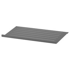 a gray plastic shelf with horizontal lines on the bottom, and one line at the top