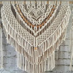 macrame wall hanging with beads and tassels