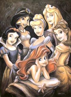 some disney princesses are posing for a picture