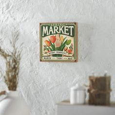 Celebrate the vibrant charm of spring with the VHC Brands Spring In Bloom Spring Market Flowers Sale MDF Block Sign. Measuring 8x8 inches, this square sign features a delightful announcement: Spring Market Every Weekend March Thru May. The text is accompanied by a bouquet of tulips in refreshing shades of green, peach, and creme, adding a touch of floral elegance to the design. Crafted from MDF and adorned with a digital print, this sign combines functionality with seasonal cheer. The cypress gr Bouquet Of Tulips, Balloon Valance, Market Flowers, Spring Market, Vhc Brands, Cream Tones, Kitchen Pendants, Linen Storage, Country Store