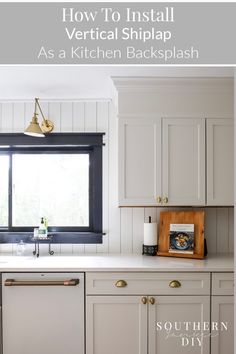 a kitchen with gray cabinets and white countertops is featured in the article how to install vertical shiplap as a kitchen backsplash