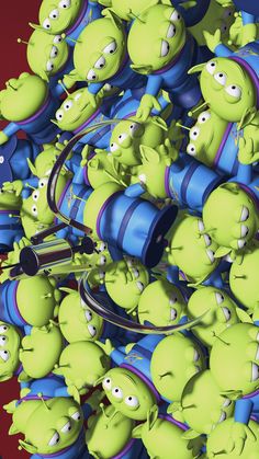 a bunch of green cartoon characters are in the middle of a pile of blue objects