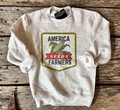 Youth sizes! As a famers wife I can't agree more with this 👆 America Needs Farmers. . Unisex fit  True to size fit 8 oz Sweatshirt  Ash color 50/50 poly cotton blend We use port & company and Ecosmart pullovers . 1-3 week turnover This is our original design. We do not sell our designs.  . Care instructions- wash cold with like colors. Delicate dry on low heat.  . Processing time is 1-3 weeks This image is an original design by our shop. We do have a copyright on this image. DO NOT COPY! Gifts For Farmers, Easy Gifts, Daughter Gifts, Western Outfits, Perfect Shirt, Cute Shirts, Agriculture, Original Design, Cool Shirts