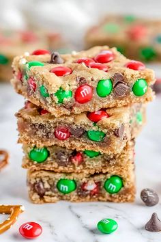 Get festive this season with these colorful Christmas cookie bars! They're packed with red and green M&Ms, plus salty pretzels for a tasty contrast. Christmas Bar Cookies Recipes, Bars For Christmas, Christmas Cookie Bars, Easy Holiday Treats, Xmas Treats, Holiday Sprinkles, Festive Desserts, Best Christmas Cookies, Whoopie Pies