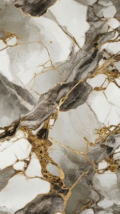 an abstract marble pattern with gold and silver accents on it's surface, as well as the veining