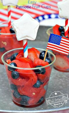 patriotic fruit cups with strawberries and blueberries in them