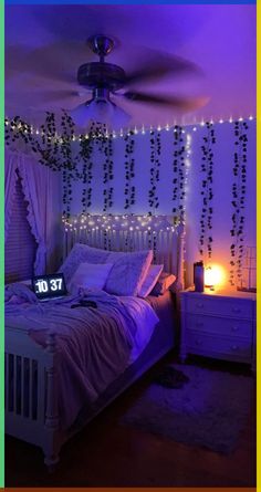 a bedroom decorated with string lights and white bedding