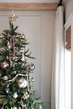 a decorated christmas tree with ornaments on it