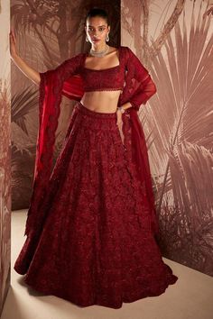 Marsala red lehenga with bead and crystal embellished floral bloom motifs. Comes with pearl embellished blouse and scalloped hem dupatta. Components: 3 Pattern: Embroidered Type Of Work: Sequin,Crystal Neckline: Square Sleeve Type: Half Fabric: Lehenga and Blouse: Net, Dupatta: Organza  Color: Red Other Details:  Bead tasselled blouse Occasion: Bride,Wedding - Aza Fashions Long Sleeves Lehenga, Red Lehenga Simple, Dark Red Lehenga, Red Sequin Lehenga, Lehnga Ideas, Square Neckline Blouse, Lehenga Simple, Red Lengha, Plain Lehenga