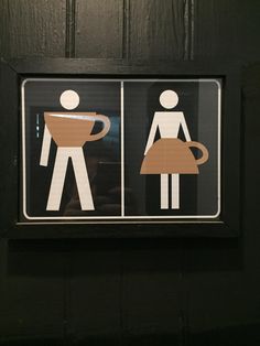 two stickers on the side of a door depicting men drinking coffee and holding a bowl