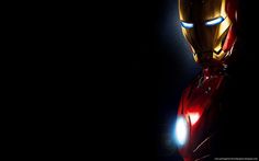 the iron man is glowing in the dark with his head turned to look like it has blue eyes