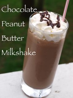 there is a chocolate drink with whipped cream on top and milkshake in the bottom