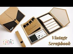 an open cardboard box with various items inside it and the words vintage scrapbook written below