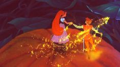 an animated scene with two people dressed as princess and prince dancing on top of a hill