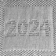 a knitted dishcloth with the letters eiffel written in cursive writing