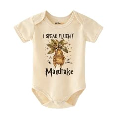 a baby bodysuit with the words speak fluent and an image of a monkey on it