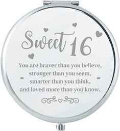 a compact mirror with the words sweet 16 and hearts in silver lettering on it's side