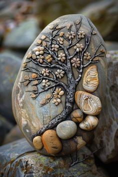 a rock with a tree and rocks on it