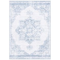 a blue and white rug with an ornate design on the bottom, in front of a white background