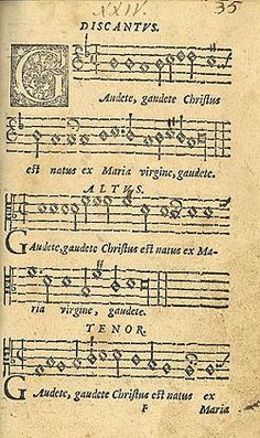 an old book with music notes on the pages and numbers in latin scripts,