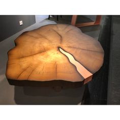 a wooden table that has been made to look like a piece of wood