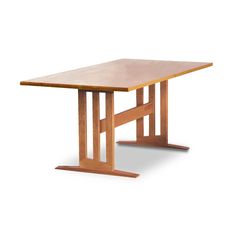 a wooden table with two legs and a square shaped top on an isolated white background