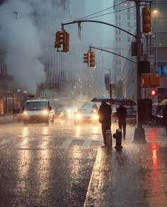 two people walking down the street in the rain with umbrellas and cars behind them