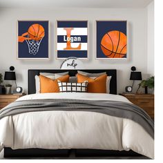 a bed room with a neatly made bed and two framed basketballs