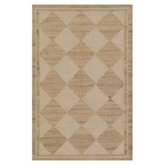 a beige rug with diamond shapes on it