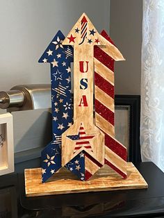 an image of a wooden house with stars and stripes on it