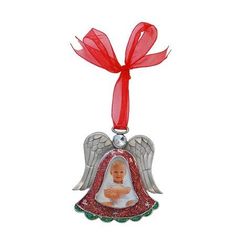 a christmas ornament with an angel holding a baby