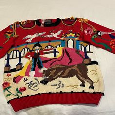 A Stunning Berek Knit Sweater By Marta D. Dated 1992! Has A Spanish-Style Bullfighting Theme. This Is A Rare Find, One Of A Kind. Gorgeous Gold Threads And Beautiful Flowers Throughout The Sweater. Has The Bull And The Bullfighter In The Front As Well As The Back. Smoke And Pet Free. New Sweater That Has Never Been Worn. Unfortunately I’ve Lost Weight And It’s Too Big. Berek Sweaters Are Unique. Measurements: 23”Pit To Pit (Flat) 29” Shoulder To Hem New Sweater, Fall Time, The Bull, Sweater Vest Women, Green Cardigan, High Neck Sweater, Burgundy Sweater, Ribbed Knit Sweater, Merino Wool Sweater