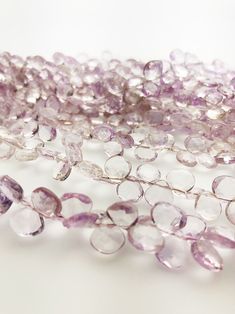 Pink Amethyst Flat Faceted Round Gemstone Beads, Semi Precious Gemstone Half off sale! Normally sold at $66.00 a strand.  Sold by the strand.  Specifications: Gemstone: Pink Amethyst  Shape: Flat Faceted Round, side drilled Size: 8mm Strand Length: 8" ----------------------------------------------------------- We ship in 1 to 3 days from Hawaii by First Class Airmail. Shipping to the USA usually takes 3 to 5 days. We import these Tahitian pearls straight from the crystal-clear lagoons of French Polynesia. Over the last 10 years of working with Tahitian pearl farmers and auction houses in Tahiti we are able to give our clients a large selection of Tahitian Pearls to choose from with competitive prices and excellent quality. Our office is in Hawaii on the island of Oahu. We are open Monday t Lavender Round Bead Crystal Necklaces, Lavender Crystal Necklaces With Round Beads, Amethyst Gemstone Beads For Jewelry Making, Purple Rondelle Gemstone Beads, Rondelle Amethyst Gemstone Beads, Amethyst Rondelle Gemstone Beads, Faceted Amethyst Beads, Faceted Round Amethyst Beads, Round Faceted Amethyst Beads