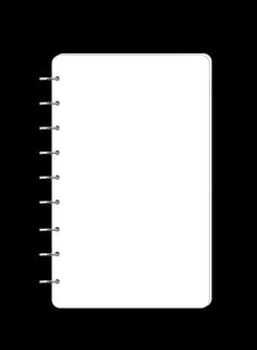 an open notebook on a black background with clippings to the front and side