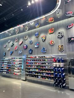 the inside of a sports store with many items on display