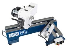 a machine that is sitting on top of a blue object with the word mid pro