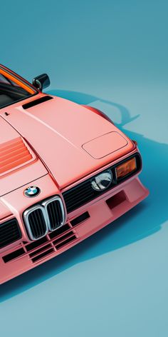 an orange bmw sports car on a blue background