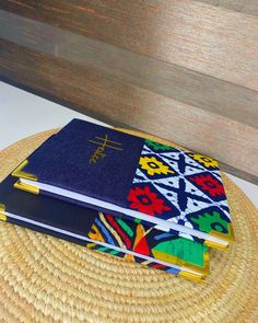 Write down your thoughts where forgetfulness don’t exist with our Ankara notebooks.✍️📚 They can be custom made, used as souvenirs, they also make thoughtful gifts. 🏷️ #4,000 - #4,500 We take bulk and wholesale orders. To order, send a DM. #AnkaraNotepad #StayOrganized #CaptureYourThoughts #NeverForget #StationeryLove #Journaling #NotebookAddict #WriteItDown #CreativeWriting #StylishStationery Ankara Notebooks, Nurse Graduation Party Decorations, Make Journal, Africa Artwork, Nurse Graduation Party, Ankara Accessories, Souvenir Ideas, African Inspired Decor, Hamper Ideas