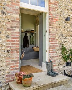 the instagram page shows an image of a brick house and its front door open